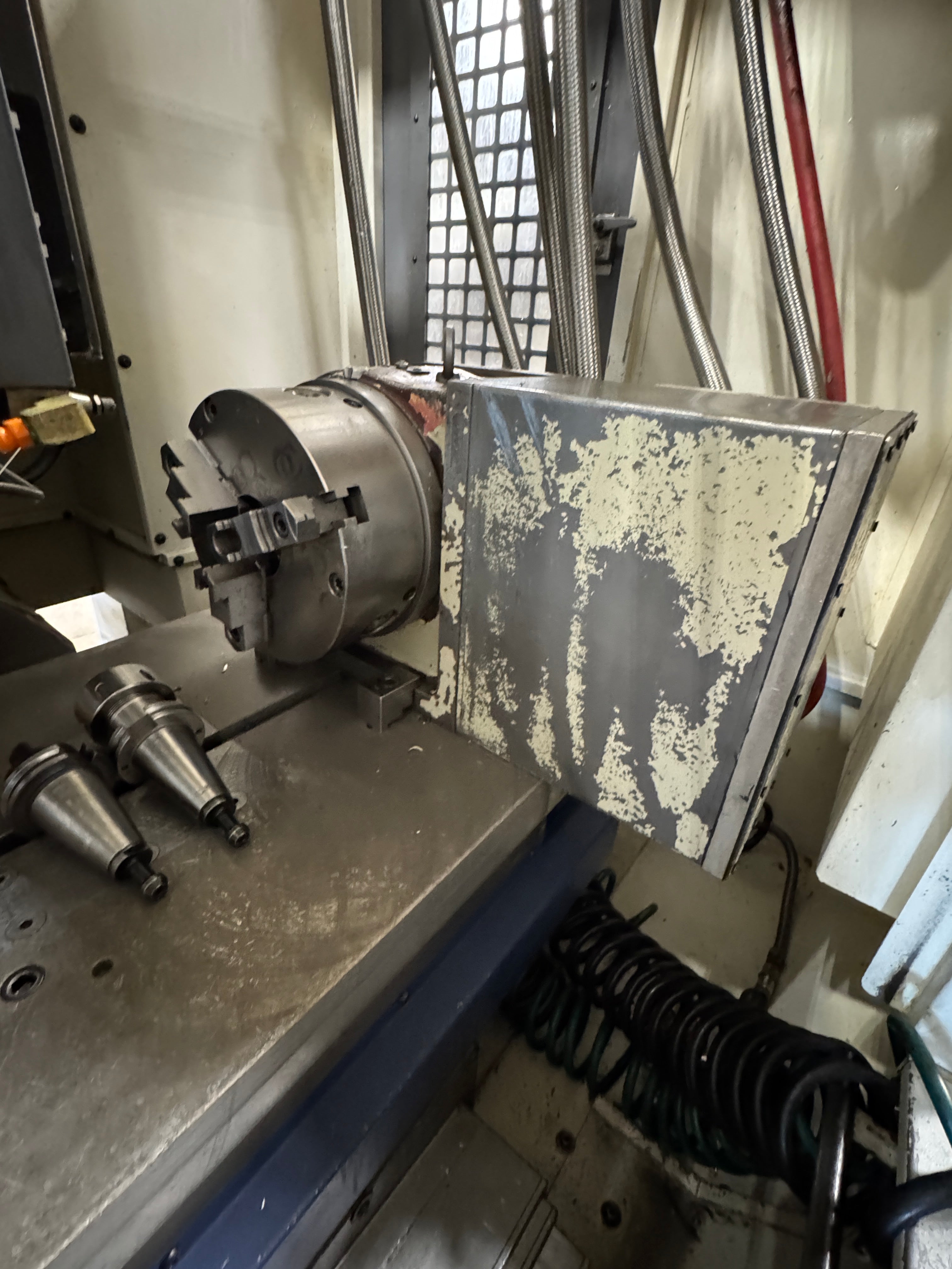 YCM FV560A CNC vertical milling machine with BT40 spindle and FANUC control – Stan Canada