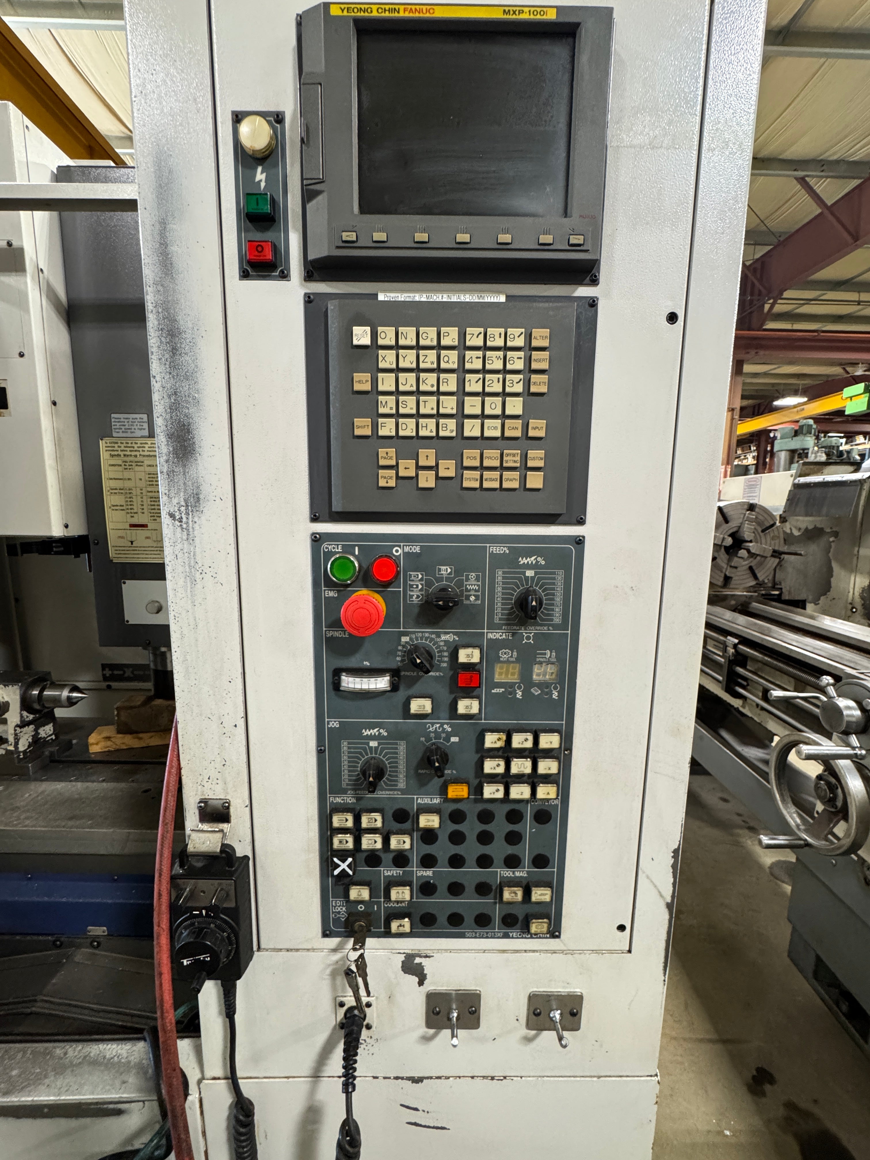 YCM FV560A CNC vertical milling machine with BT40 spindle and FANUC control – Stan Canada