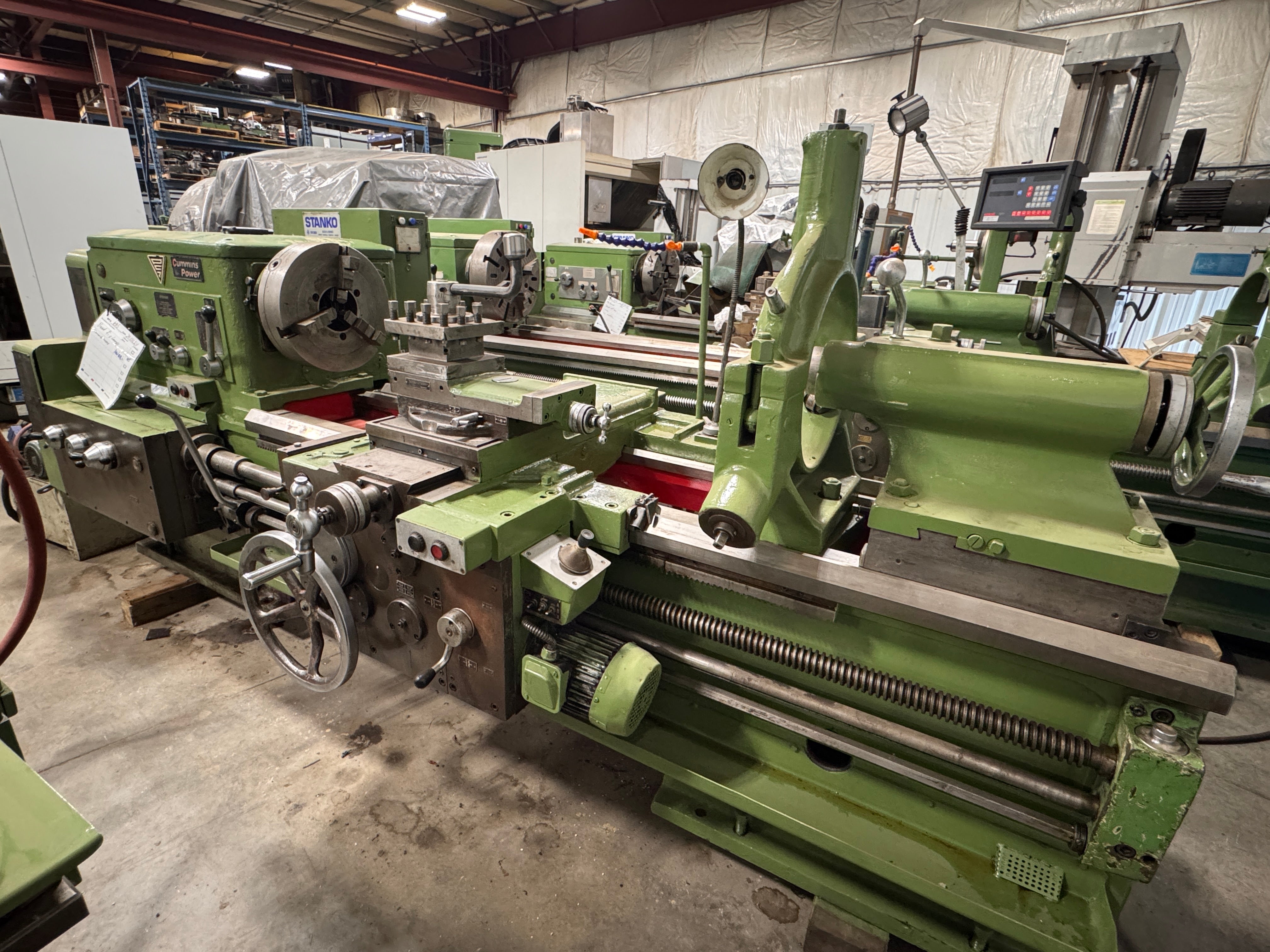 1M63-B1 engine lathe with 28" swing and 60" centers, 3-jaw chuck, and steady rest - Modern