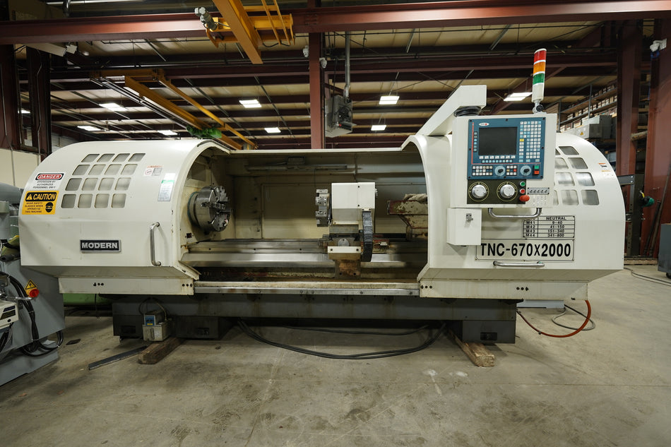 Modern TNC 670 x 2000 CNC Lathe with 26-inch Swing, 80-inch Centers, and 6.25-inch Bore Modern
