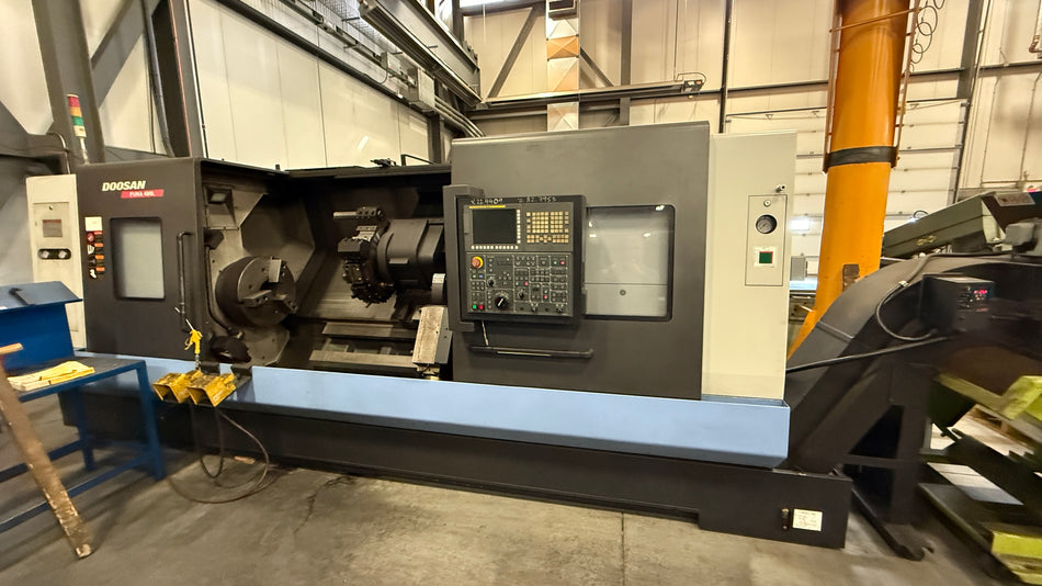 PUMA 480L CNC lathe with 900 mm swing, 992 mm turning length, and 10-position turret – Stan Canada
