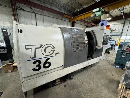YCM TC-36 horizontal CNC turning center with 23" swing and Fanuc control – Stan Canada Modern